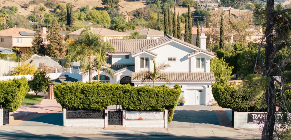 Tranquility Recovery Center in Sun Valley, Los Angeles, surrounded by serene mountain scenery.