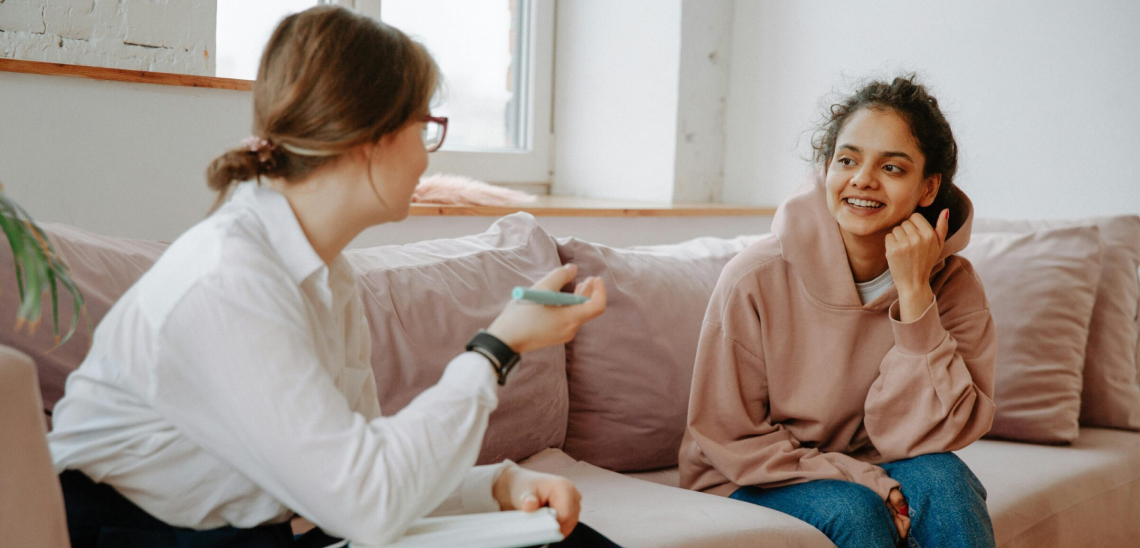 Young Woman Talking with Therapist at outpatient rehab san fernando valley