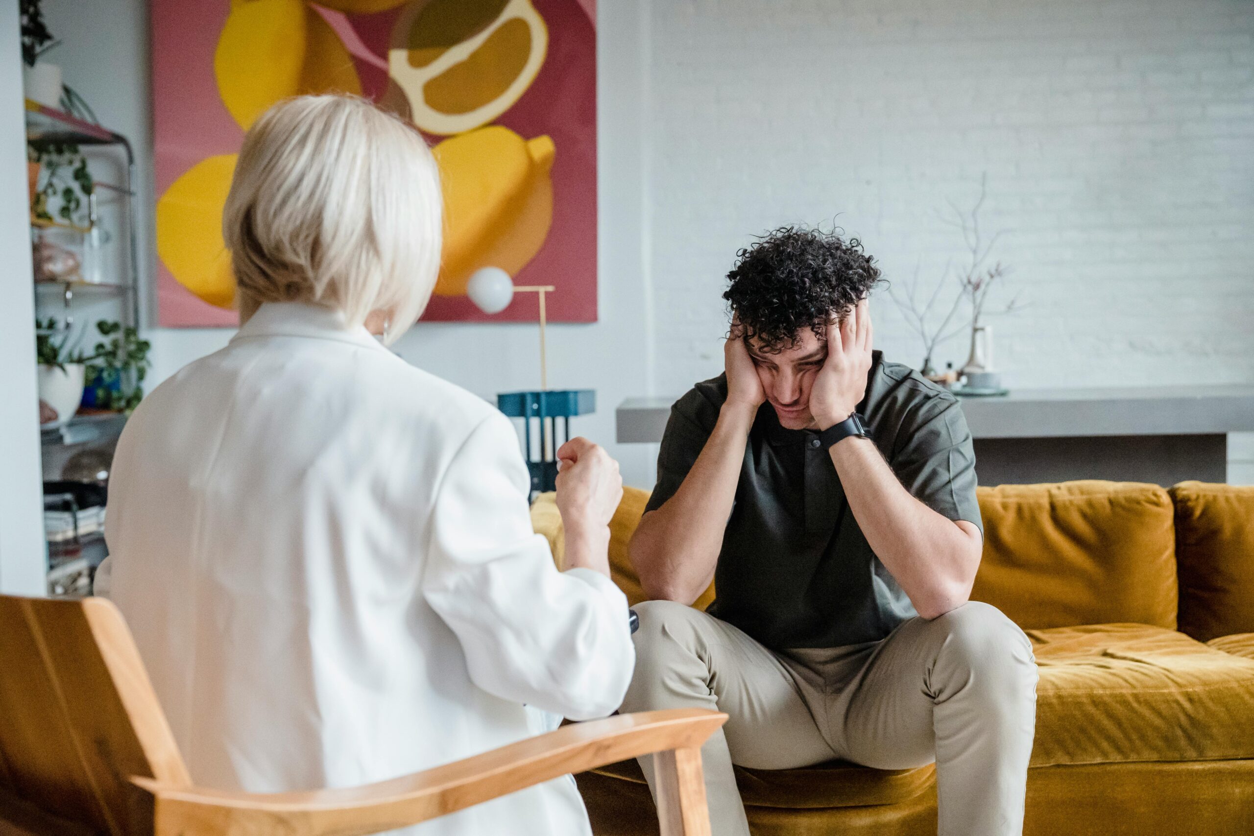 A therapist teaching someone how to help an alcoholic.