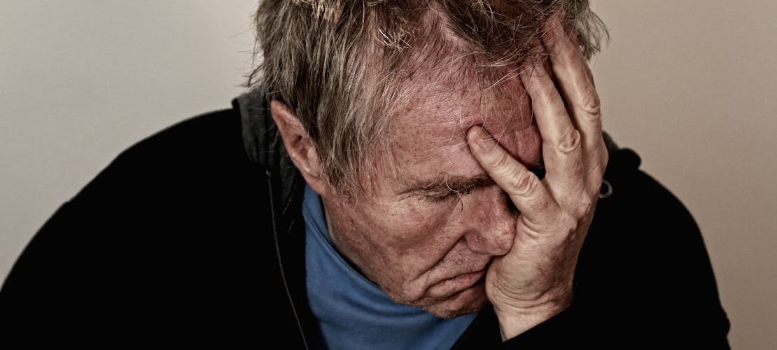 A man experiencing addiction relapse warning signs
