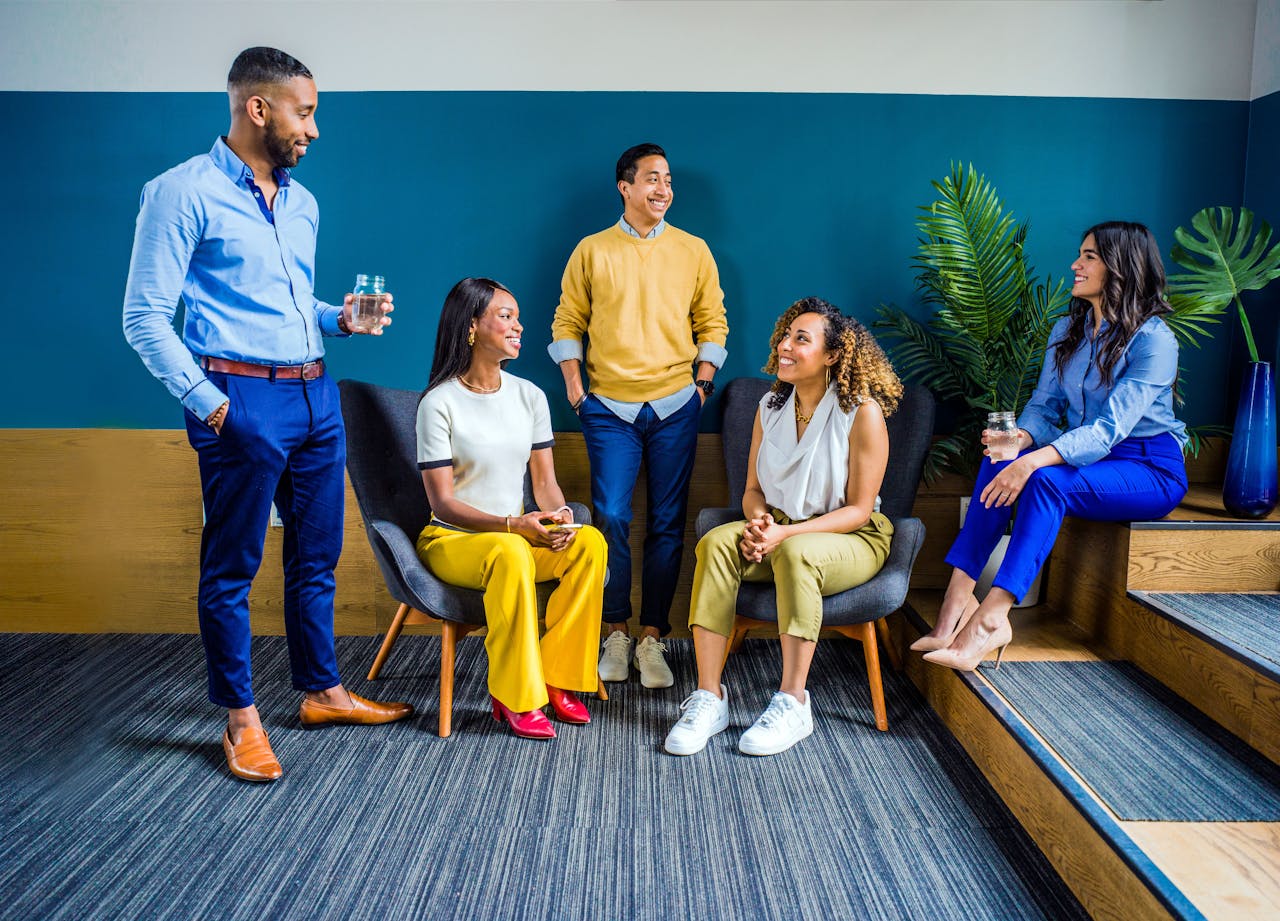 A group of team members discussing alcoholism in the workplace