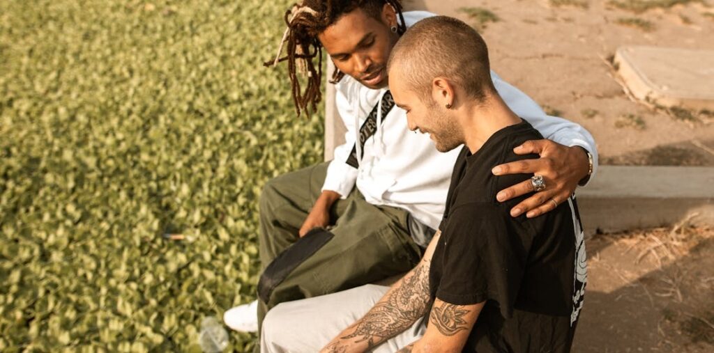 Two young men talking