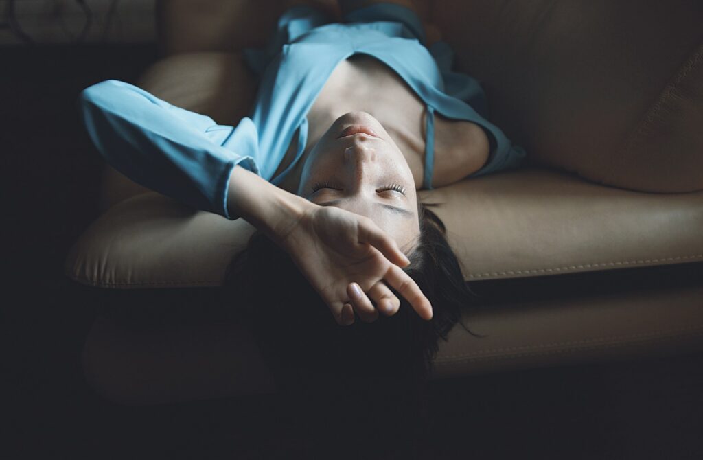 woman lying on the bed
