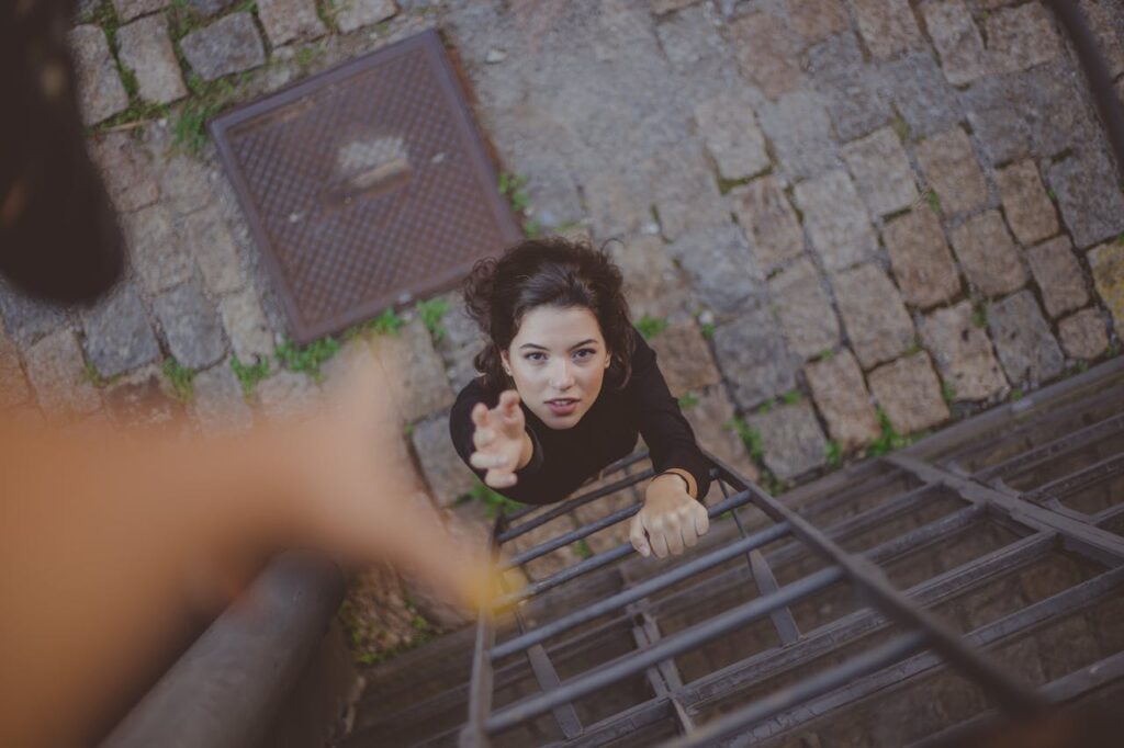woman climbing the ladder 