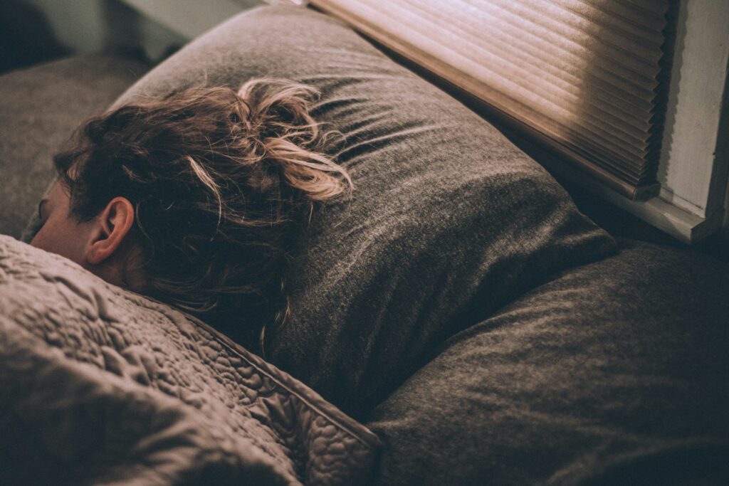 woman with bipolar disorder and alcohol problems sleeping