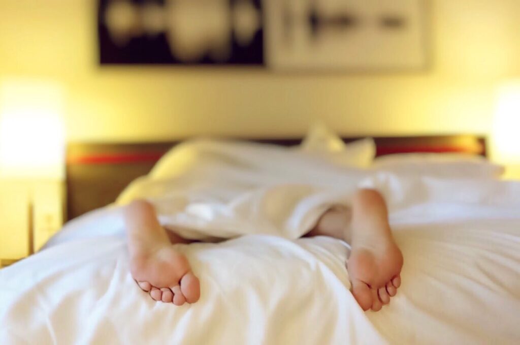 man sleeping and dreaming about lifestyle changes to support recovery