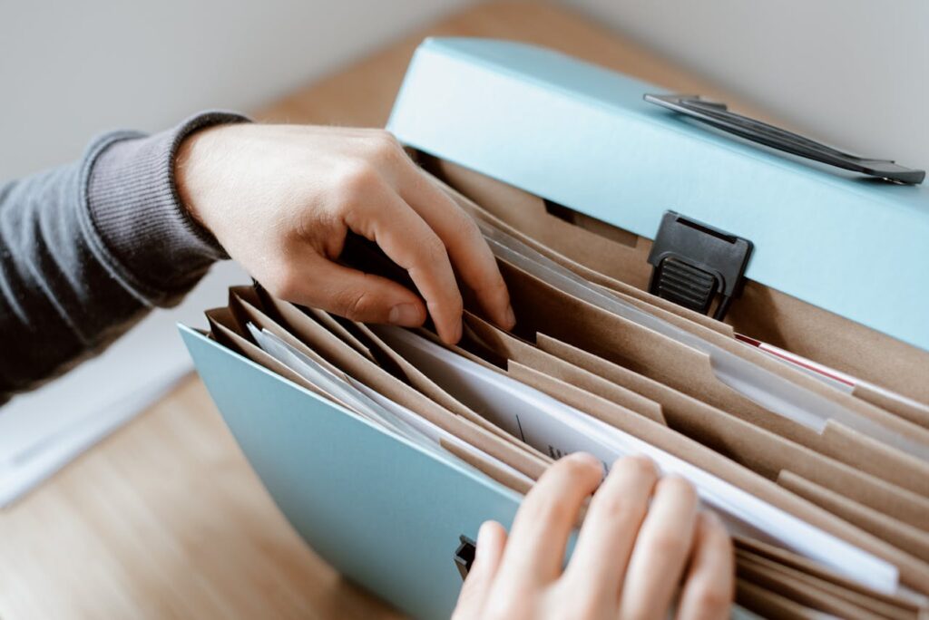 a man sorting paperwork