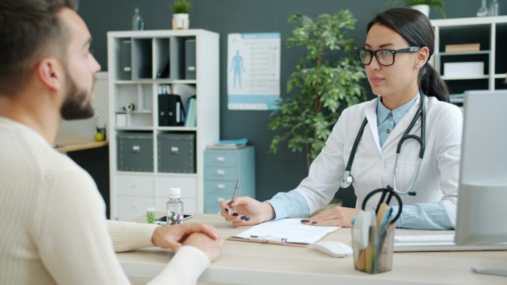 doctor answering FAQs about addiction treatment