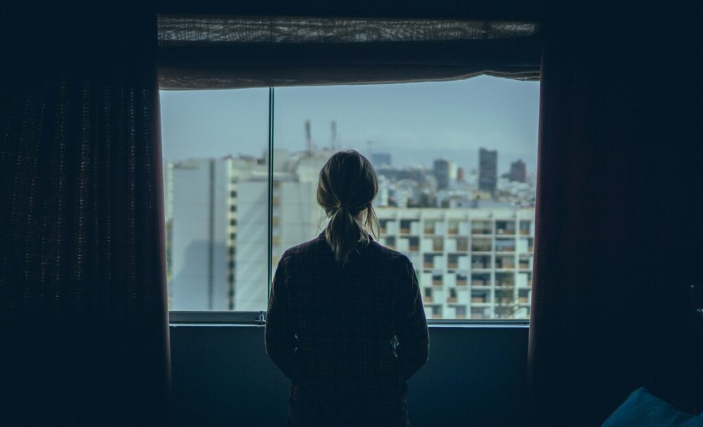 woman thinking about mental health and addiction treatment