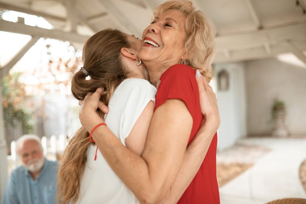 mom and daughter hugging